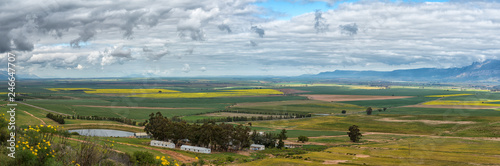 Panoramic farm landscape seen from the Piekenierskloof Pass photo