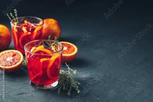 Red orange juice in a large glass or aperitif with campari photo