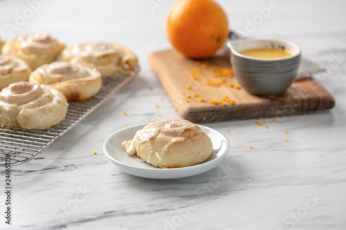 Freshly Baked Homemade Orange Rolls on Kitchen Counter