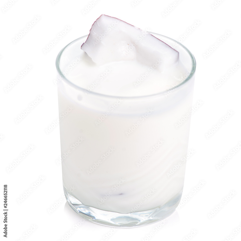 A glass of coconut milk on a white background. Isolation A glass of coconut milk on a white background. Isolation