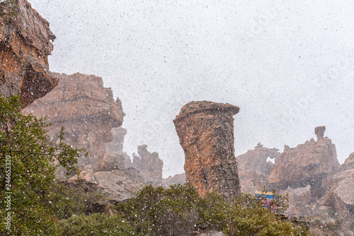 Snow is falling at the Stadsaal Caves in Cederberg Mountains photo