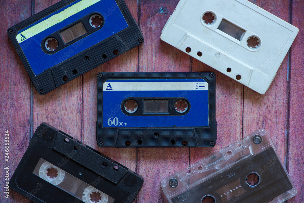 Fototapeta premium Several old analog cassette tapes of various colors