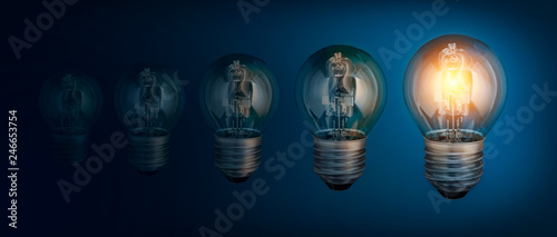 Lightbulbs on blue background, idea concept