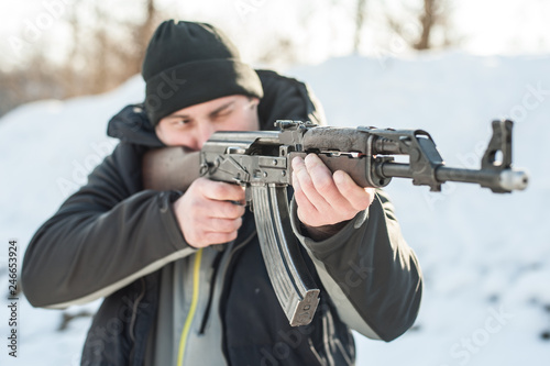 Front view gun point riffle machine gun. Shooting and weapons