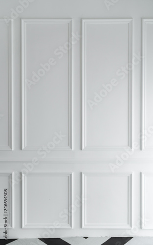 Classice wooden stripe frame install on white painted wall / background concept/ set scene / natural light