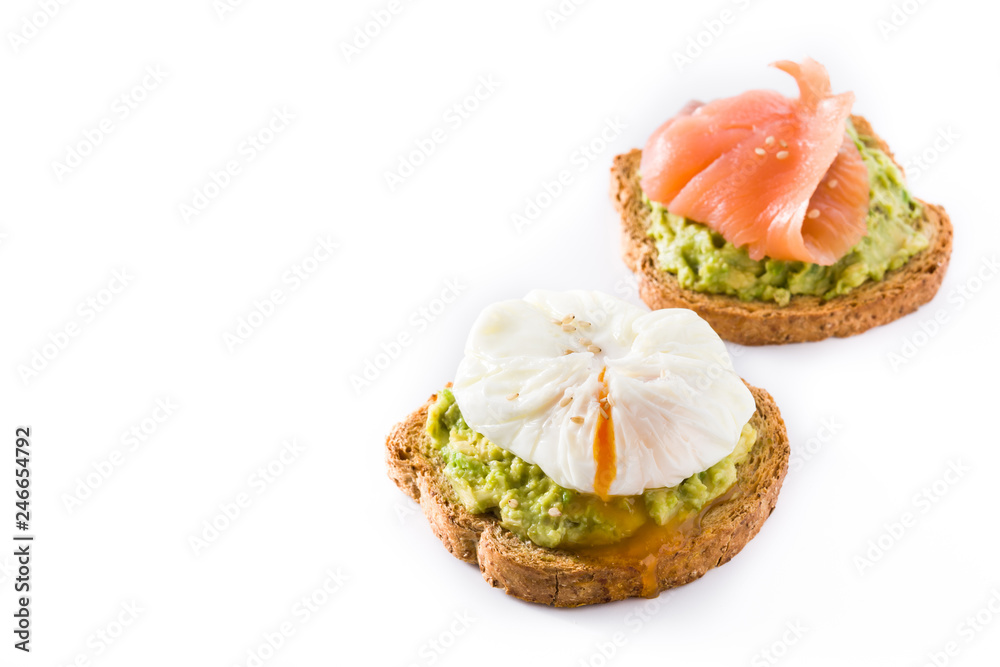 Toasted breads with avocado, poached eggs and salmon isolated on white background. Copy space