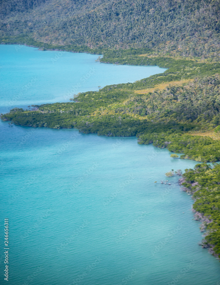 Beautiful coastline of Queensland with forest, aerial view Beautiful coastline of Queensland with forest, aerial view