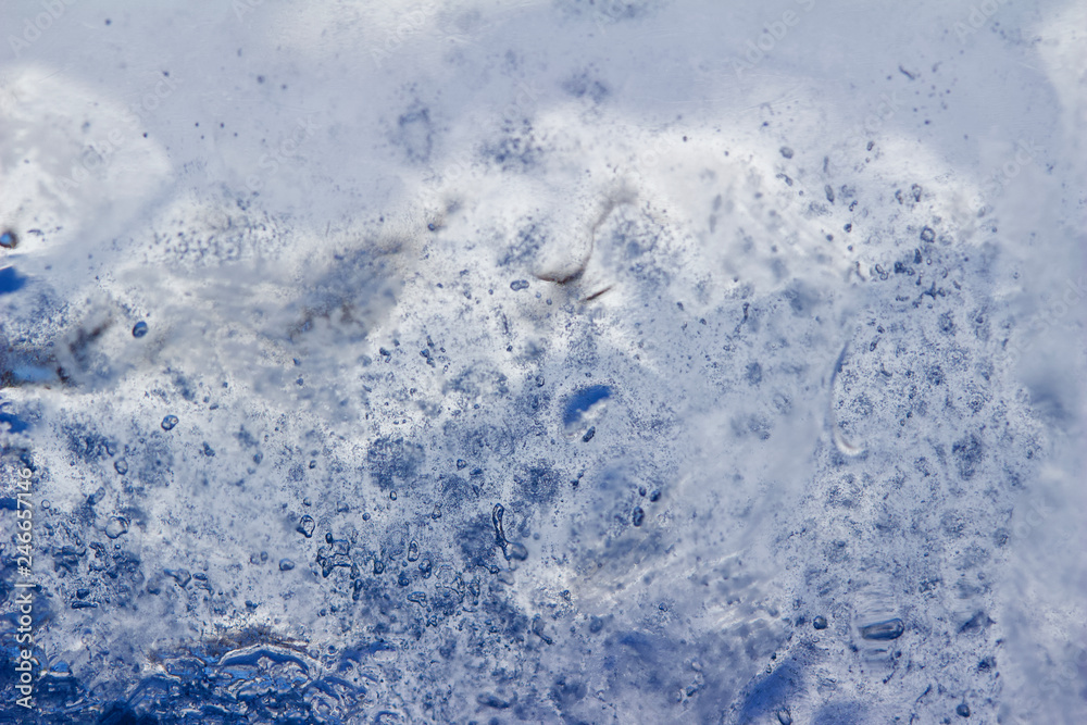 Whimsical macro abstract art background of frozen water condensation on a glass window in winter Whimsical macro abstract art background of frozen water condensation on a glass window in winter