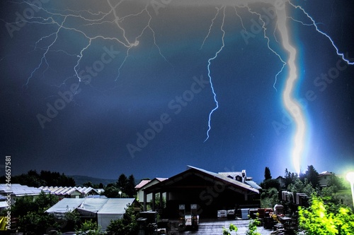 Multiple lightnings in our village, shot from my window
