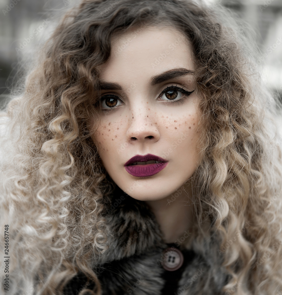 Young woman with freckle close up portrait Young woman with freckle close up portrait