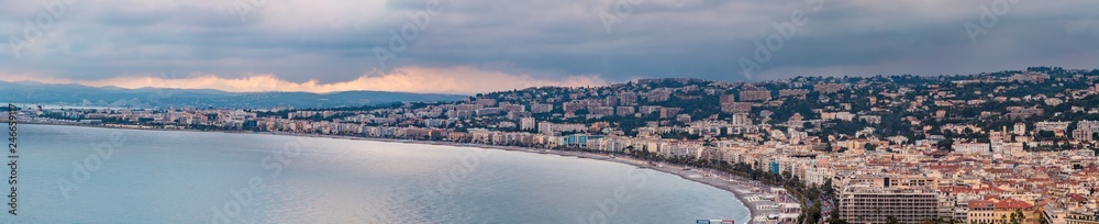 Nice, France - June 12, 2018: Nice beach sunset landscape, France. Nice beach and famous Walkway of the English, Promenade des Anglais. Famous French touristic town