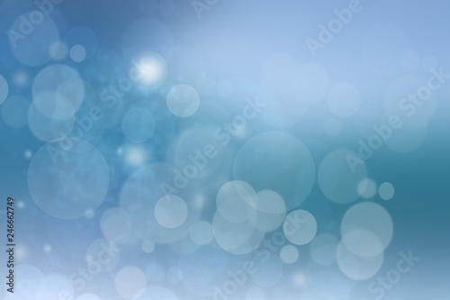 Abstract colorful blur blue texture background with white and blue bokeh circles in soft color style. Template for underwater backdrop or winter design illustration.