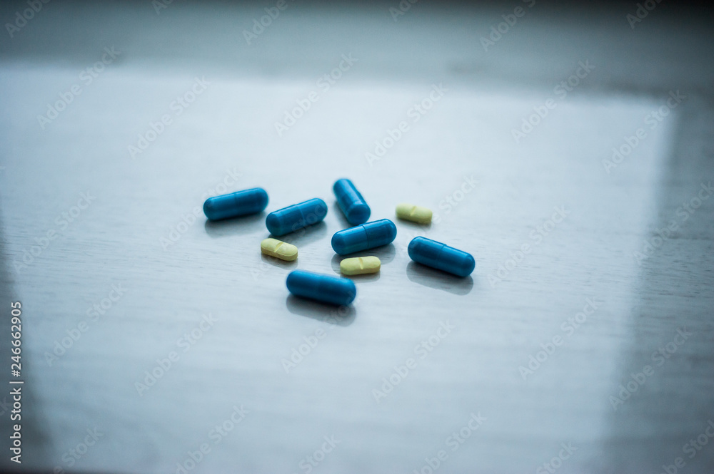 pills on a gray background pills on a gray background