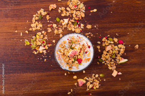 Oatmeal with dried fruit and milk photo