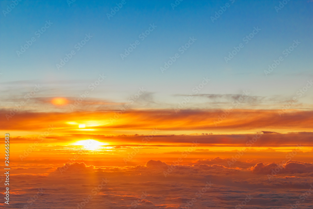 Beautiful Golden Sunset over Clouds