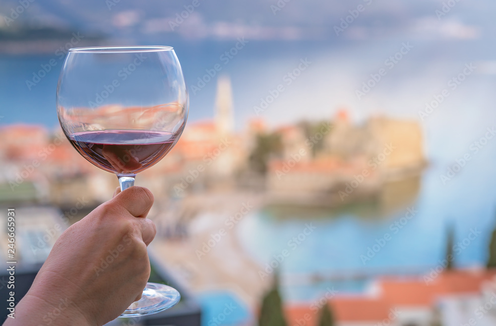 Drinking red wine in Budva