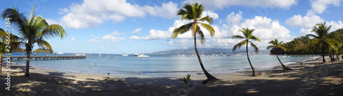 Superb panoramic view of the beautiful beach of Anse à l'Ane near the village of Trois-Ilets in Martinique facing the city of Fort-de-France