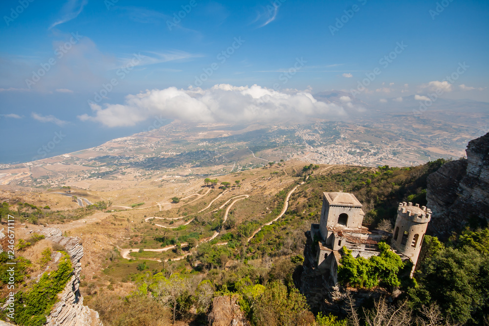 Panoramic view taken from historic town Erice located at the top of Erice Mountain, clouds over beautiful Trapani cityscape