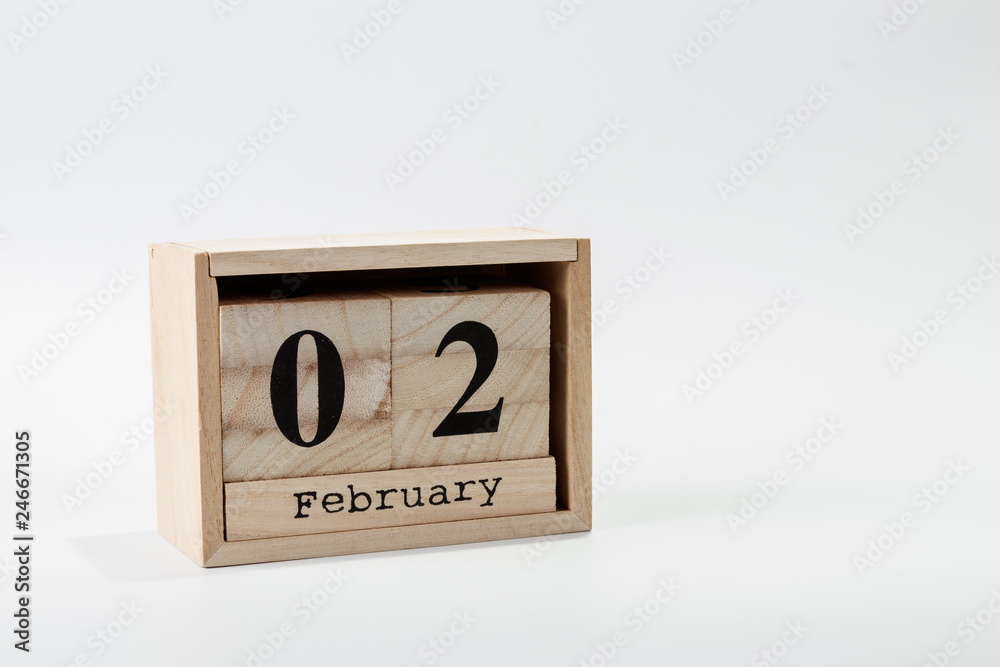 Wooden calendar February 02 on a white background Wooden calendar February 02 on a white background