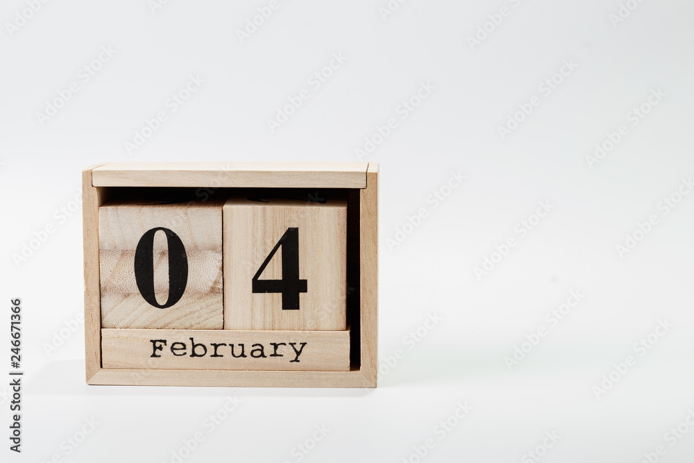 Wooden calendar February 04 on a white background Wooden calendar February 04 on a white background
