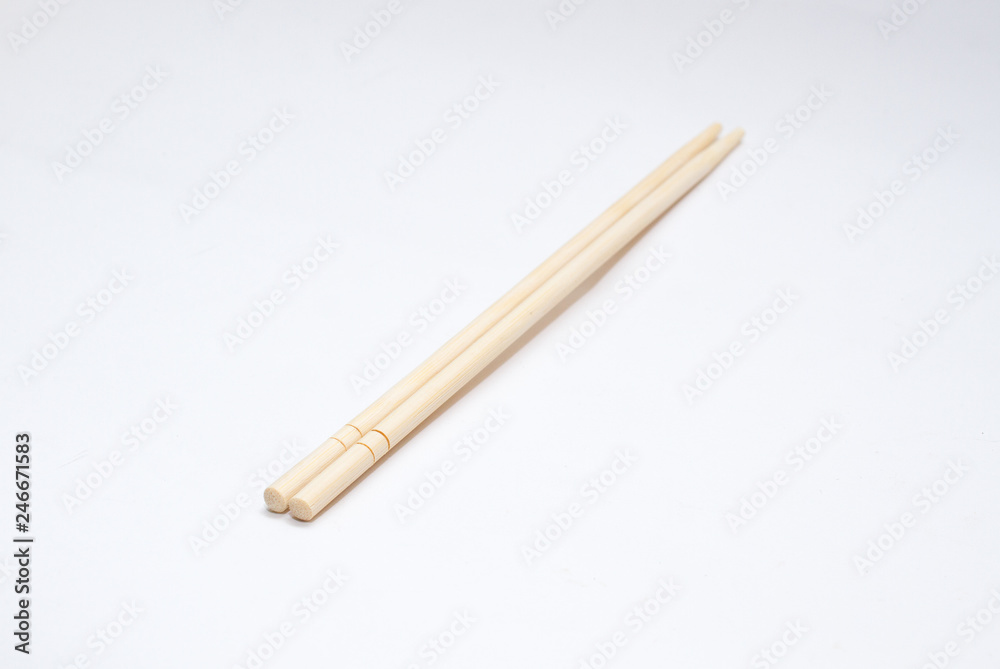 Chinese sticks on a gray background. View from above Chinese sticks on a gray background. View from above