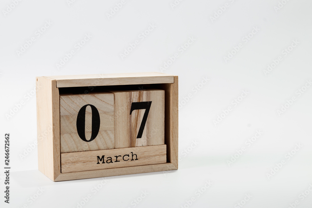Wooden calendar March 07 on a white background Wooden calendar March 07 on a white background