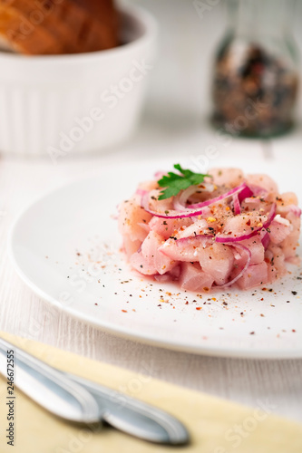dish food of raw fish with whitefish on a light surface. national dish of the Northern peoples