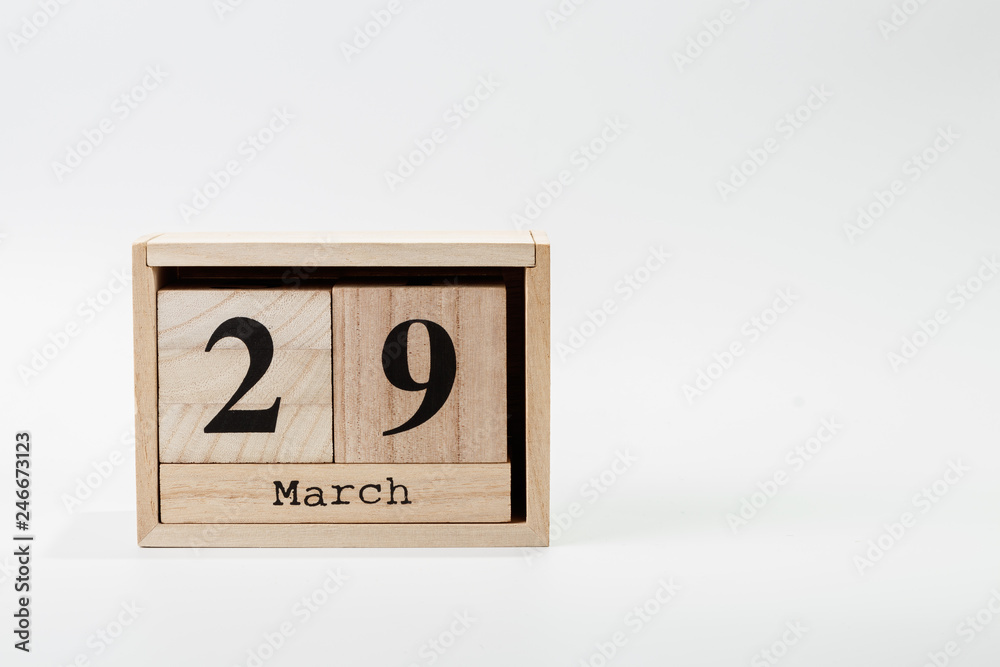 Wooden calendar March 29 on a white background Wooden calendar March 29 on a white background