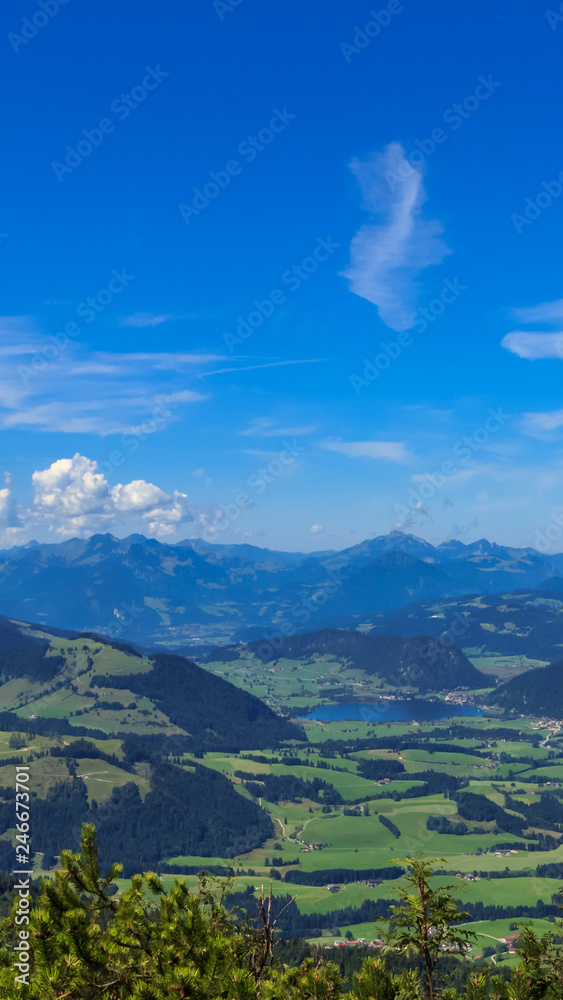 Naklejka premium Smartphone HD wallpaper of beautiful alpine view at Koessen - Tyrol - Austria