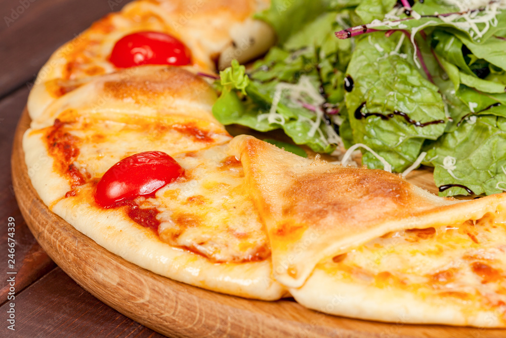  appetizing, fresh pizza on the table, for a design decoration in cooking