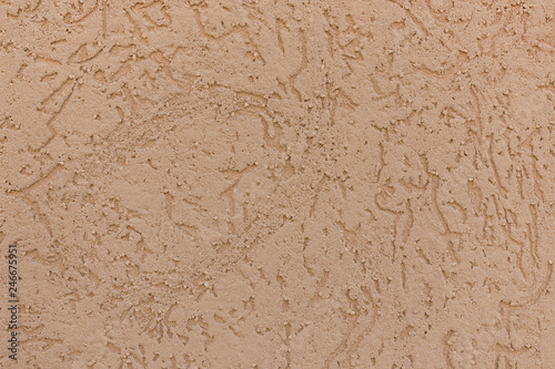 Beige texture in the form of a plane of stone eaten by worms