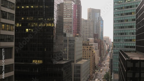 This is a time lapse of traffic on Lexington Ave. in NYC.  This time lapse shows the duration from day to night to reveal the cars headlights. The city that never sleeps. photo