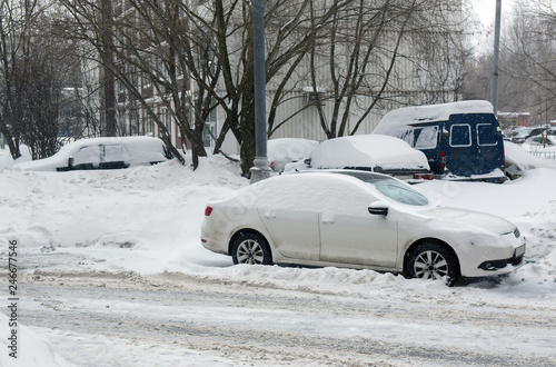 cars in the Parking lot in the winter © Yuri Bizgaimer