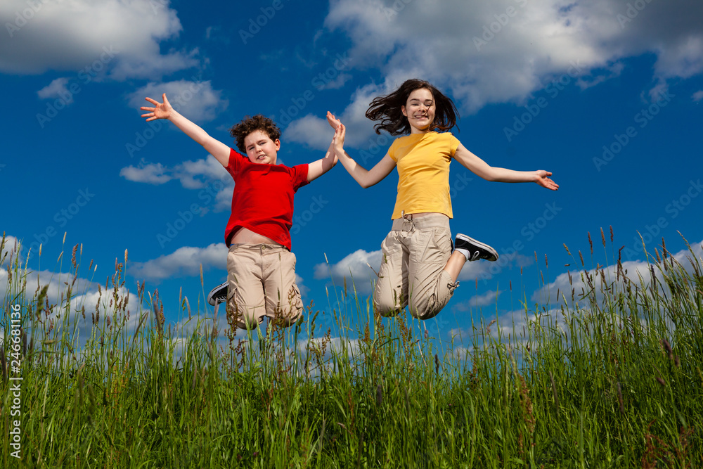 Girl and boy running, jumping outdoor Girl and boy running, jumping outdoor