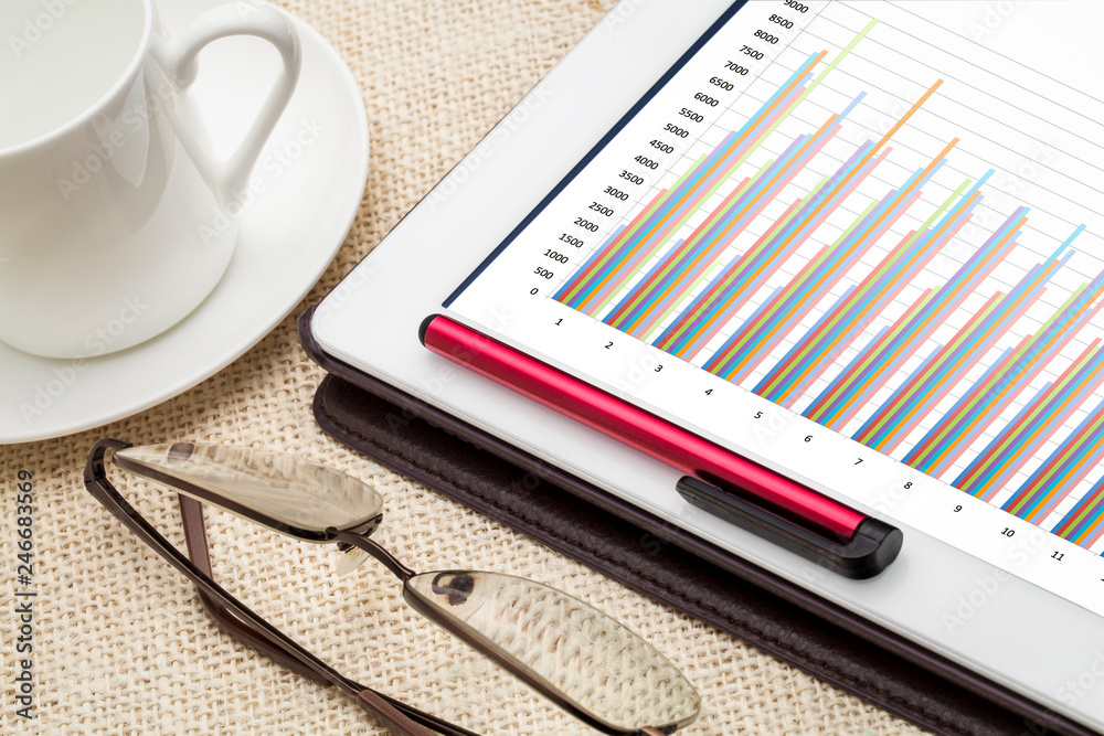column business chart on tablet column business chart on tablet