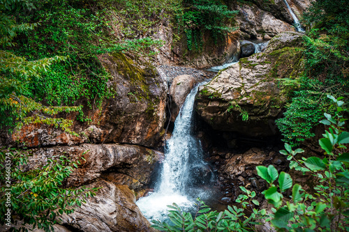 Mountain cascade waterfall. Eastern Abkhazia. Near the town of Tkvarcheli. Akarmara District. photo