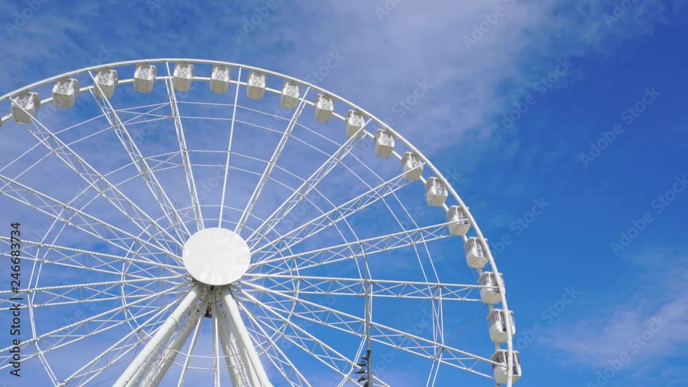 Close-up of the ferris wheel spinning in 4k Close-up of the ferris wheel spinning in 4k