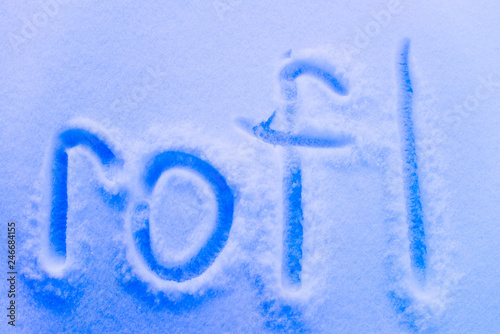 the word "rofl" written in the snow