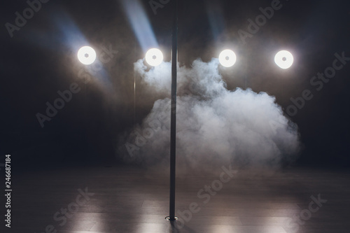Foto Interior of modern dancing studio for pole dancing only.