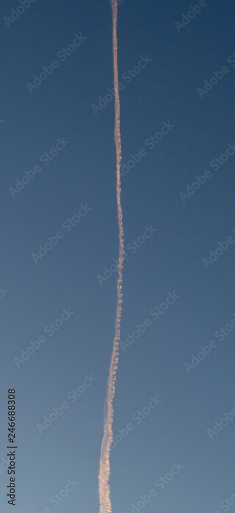 clear sky with a cloud make by a plane and white line clear sky with a cloud make by a plane and white line
