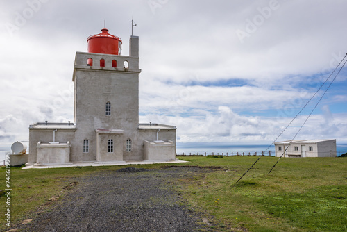 The old lighthouse on a Dyrholaey cape in south region of Iceland