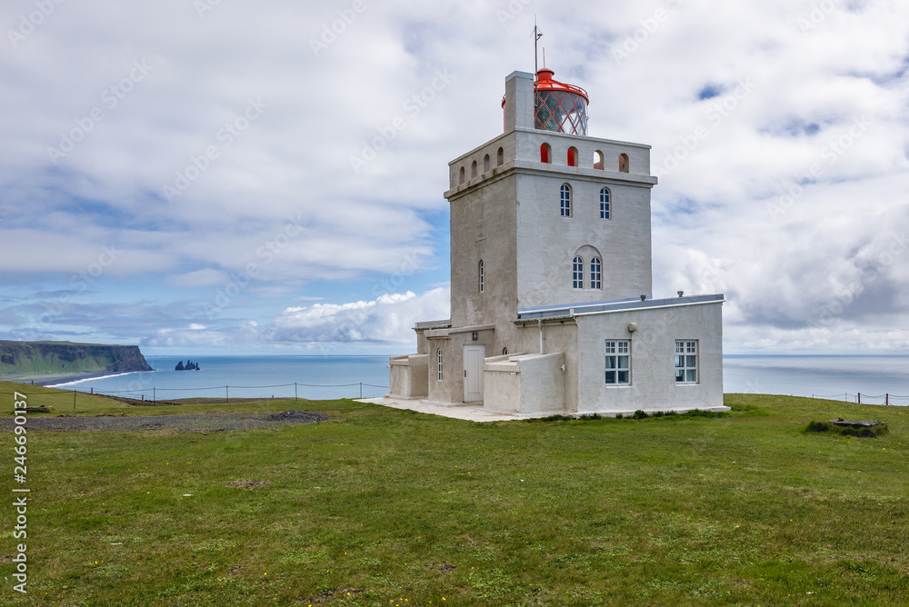 The old lighthouse on a Dyrholaey cape in south region of Iceland