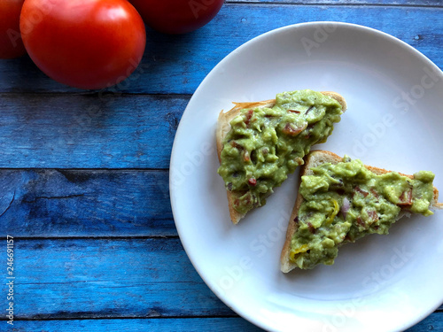 Guacamole Toast slices.  Healthy lifestyle concept. photo