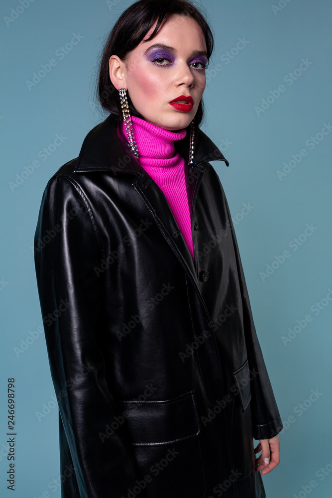 Fototapeta premium Beautiful fashionable short hair woman in leather clothing