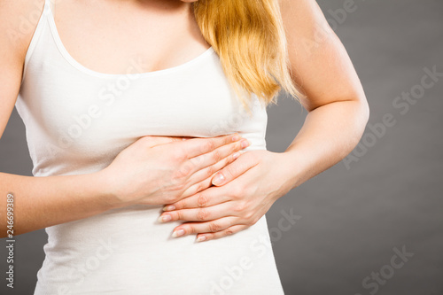 Wallpaper Mural Woman suffering from sharp chest pain Torontodigital.ca