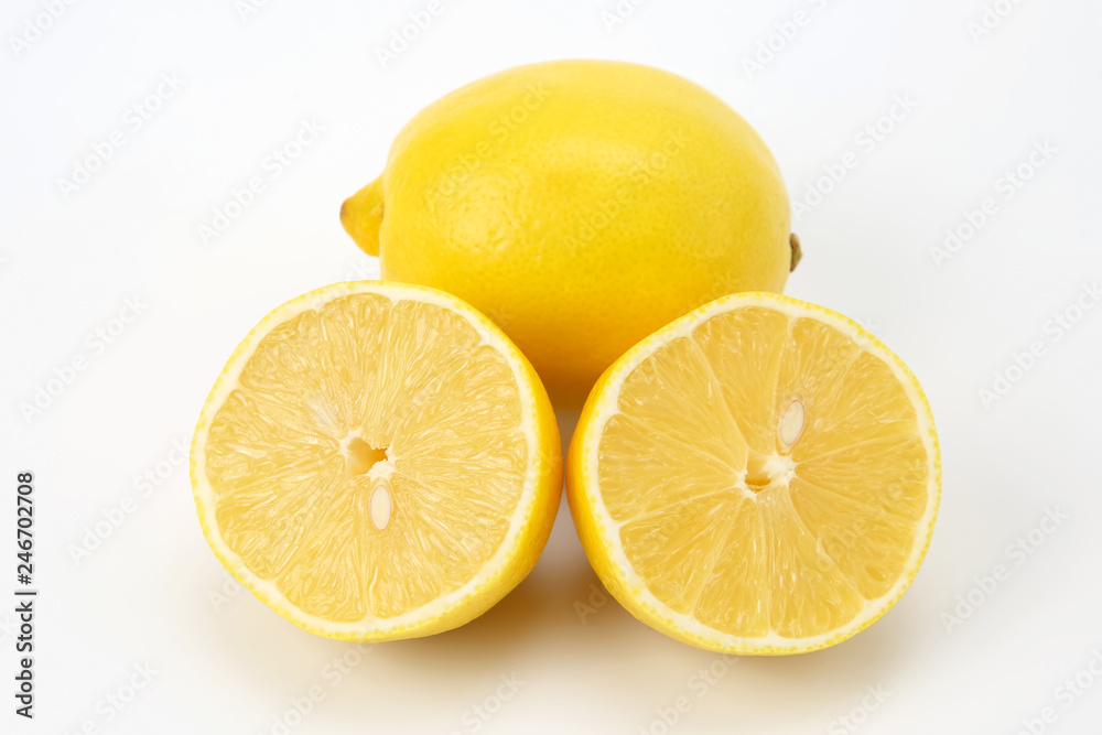 Cut citrus fruit of  lemon on white background