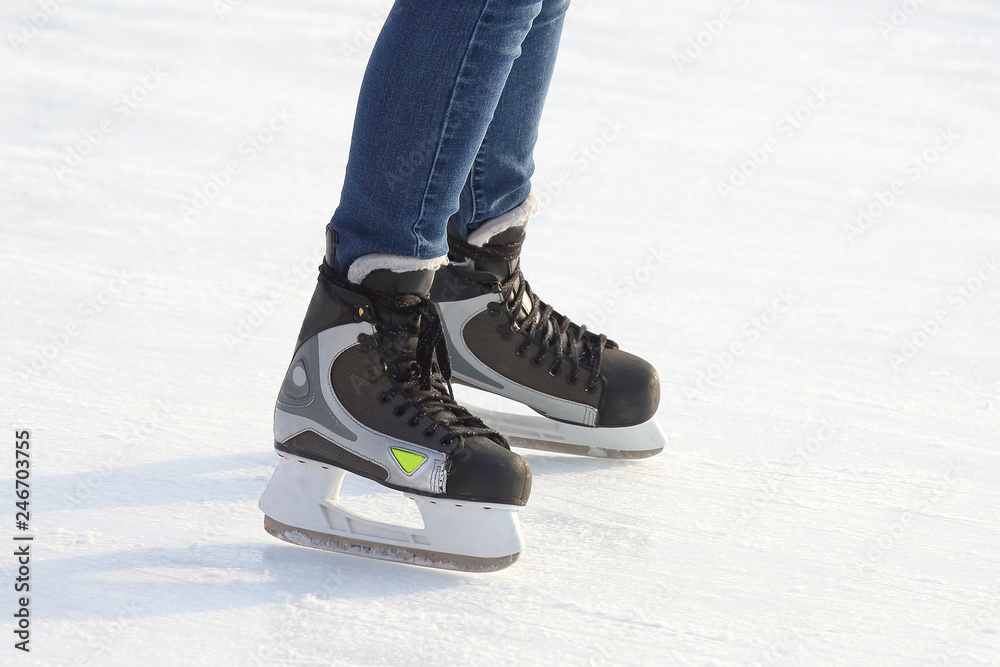 Feet skating on the ice rink Feet skating on the ice rink