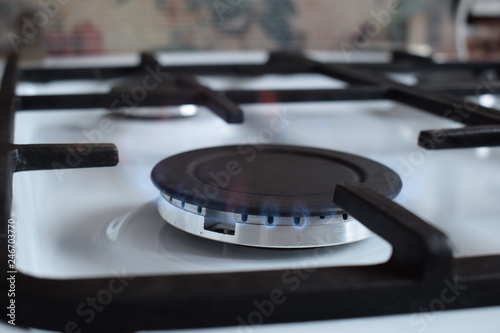 Gas stove, blue fire. The use of domestic gas for domestic purposes
