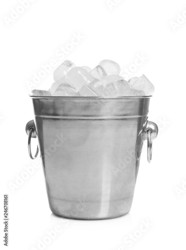 Metal bucket with pieces of ice on white background