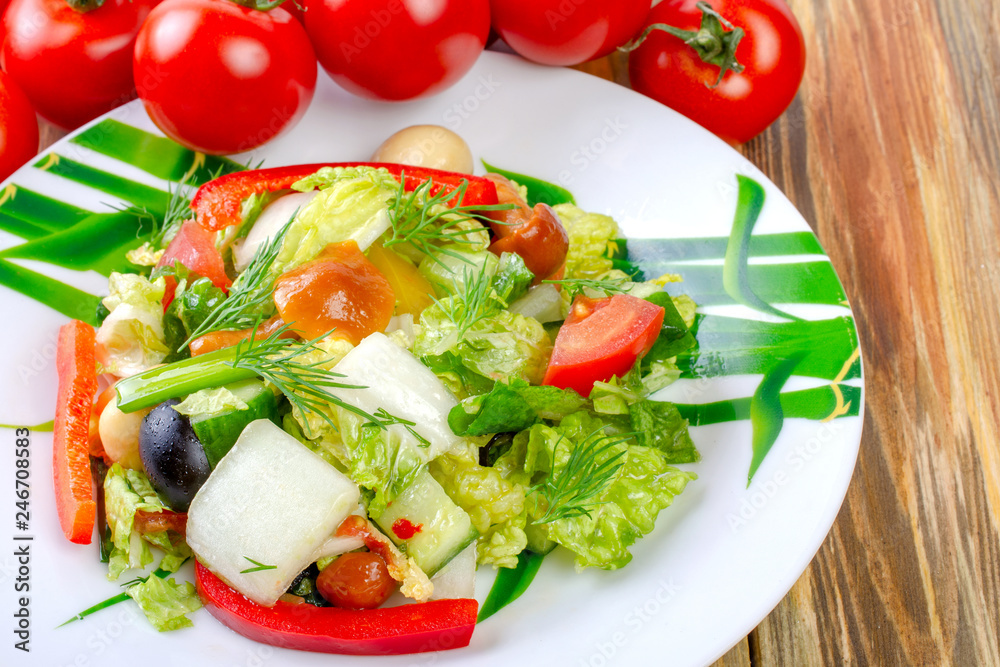Spring vegetarian salad with vegetables and pickled mushrooms.